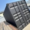 518204565_24084520587870168_1359365613162896163_n-1 20ft Used Shipping Container – Matte Black w/ 12’ Side Roll-Up Door