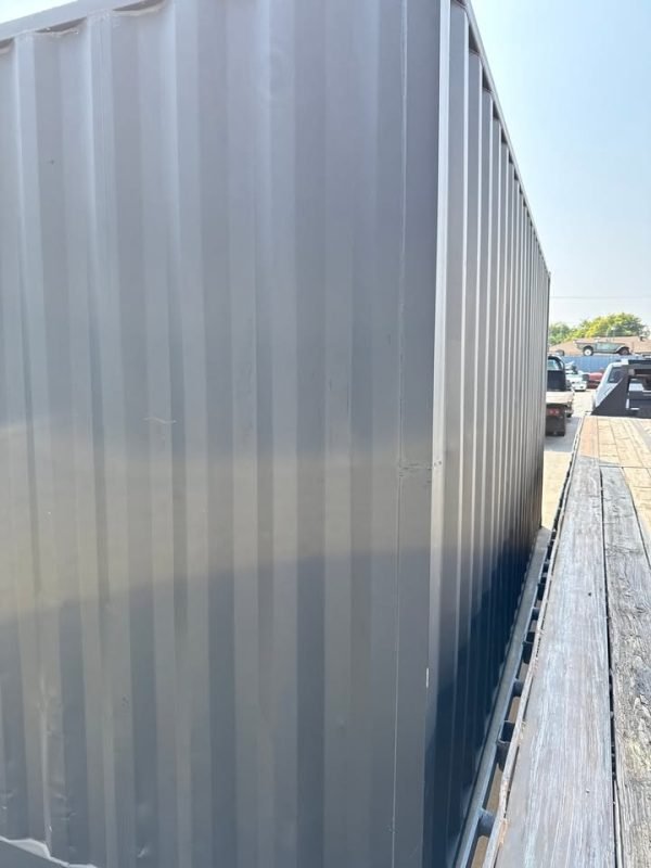 518288731_24084520584536835_7796433739846501905_n 20ft Used Shipping Container – Matte Black w/ 12’ Side Roll-Up Door