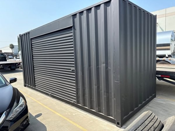 518319815_24084520591203501_6401163788766369853_n 20ft Used Shipping Container – Matte Black w/ 12’ Side Roll-Up Door